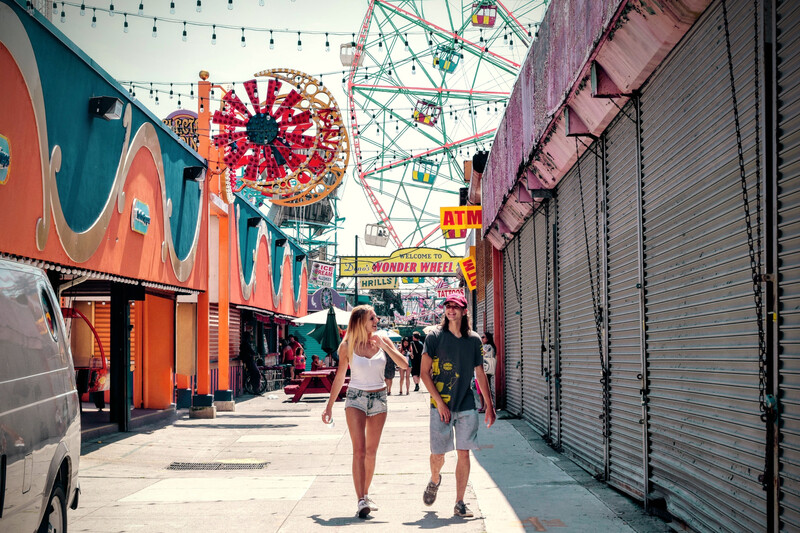couple walking through a fair