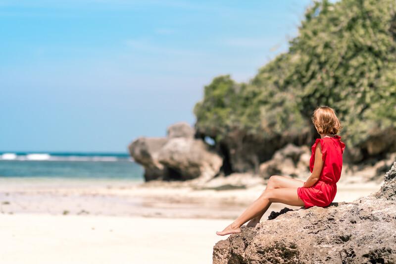 woman on the beach - explore the Gulf Coast