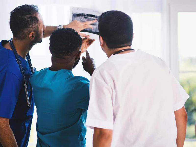 nurses and doctors in group with medical icon