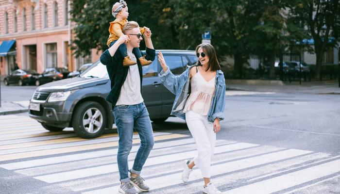 family walking downtown