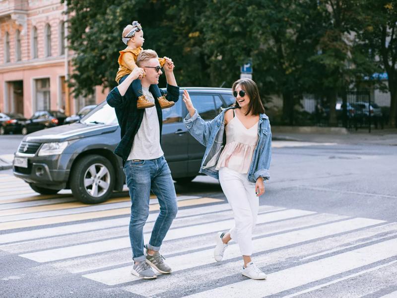 couple walking across street