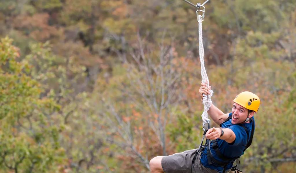 A man ziplining