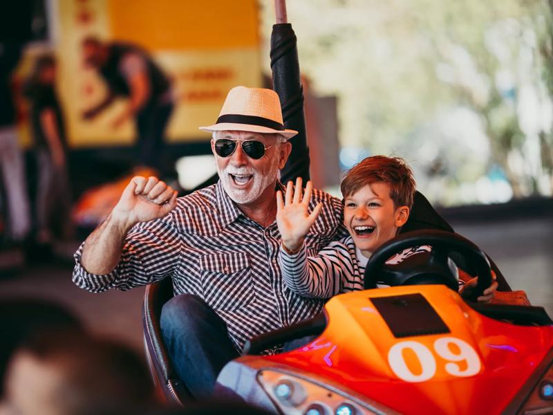 family on bumper cart