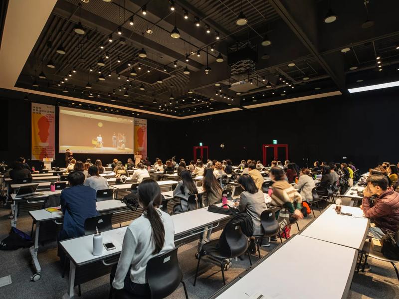 people sitting in a conference