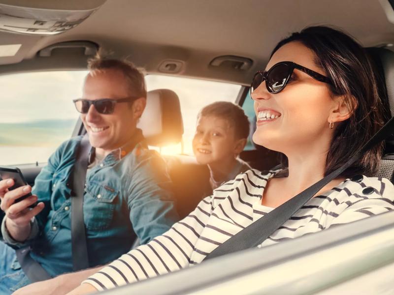 family driving in car