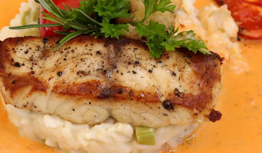 Fish dish with mashed potatoes and sauce