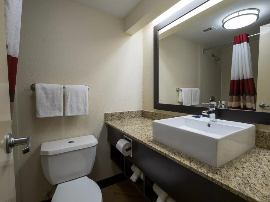 Red Roof PLUS+ Houston - Energy Corridor Superior King Room Bathroom Image