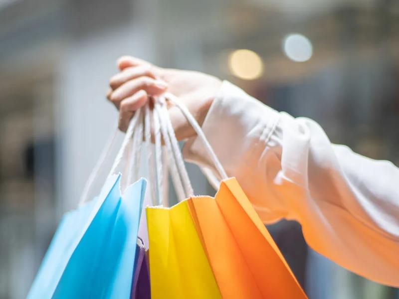 woman carrying shopping bags