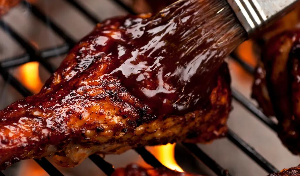 Martin's bar-b-que with wings and ribs on a grill