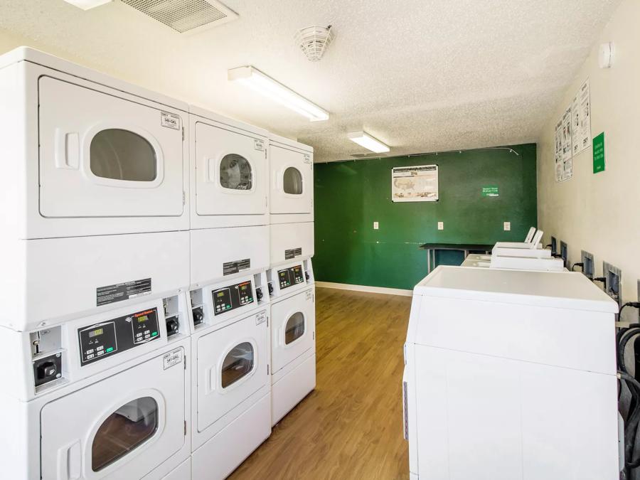 HomeTowne Studios Houston - West Oaks/ Corridor Guest Coin Laundry Image