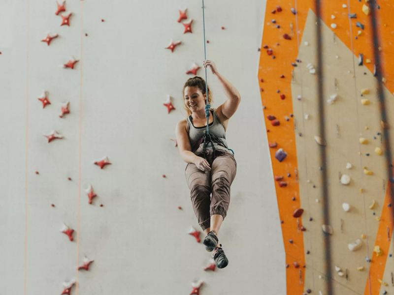 woman  indoor rock wall