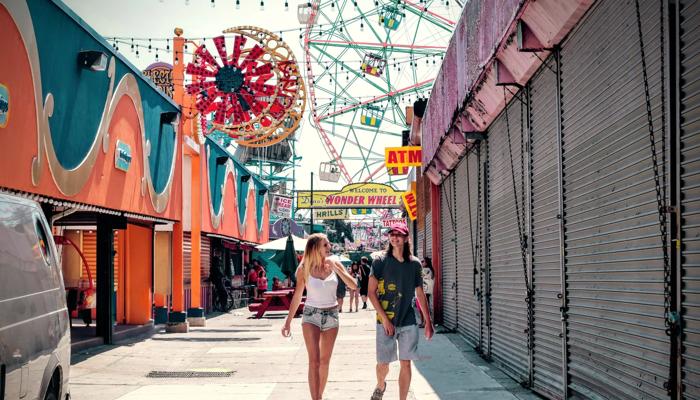 friends walking through fair