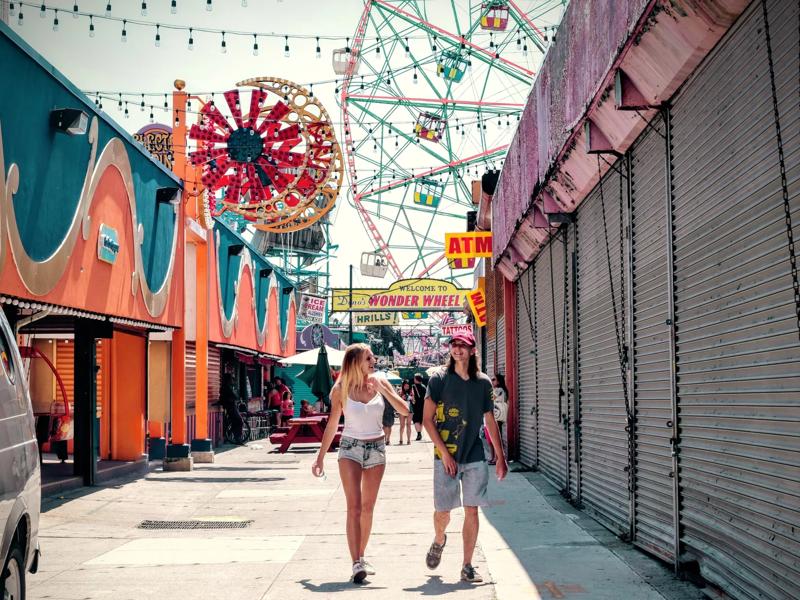 couple walking through a fair