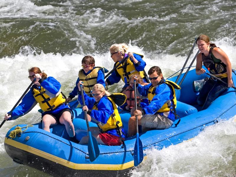 people whitewater rafting