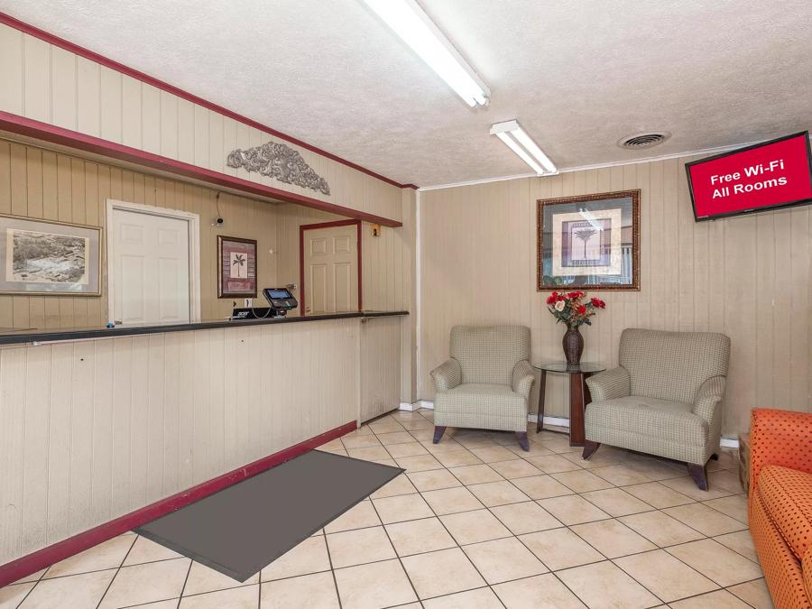 Red Roof Inn Starkville - University Front Desk and Lobby Sitting Area Image