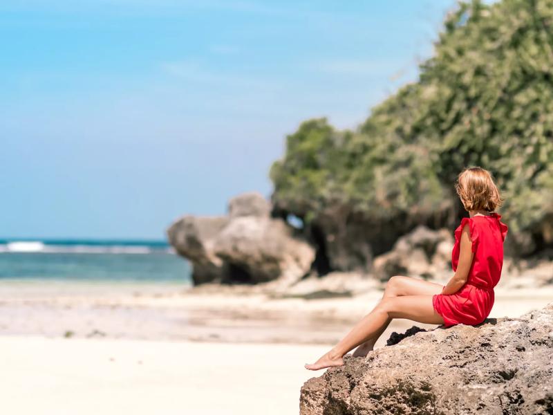 woman on the beach - explore the gulf coast