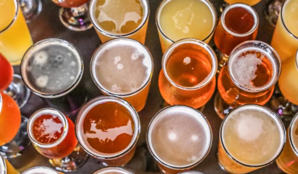 Assorted craft beer glasses on a table