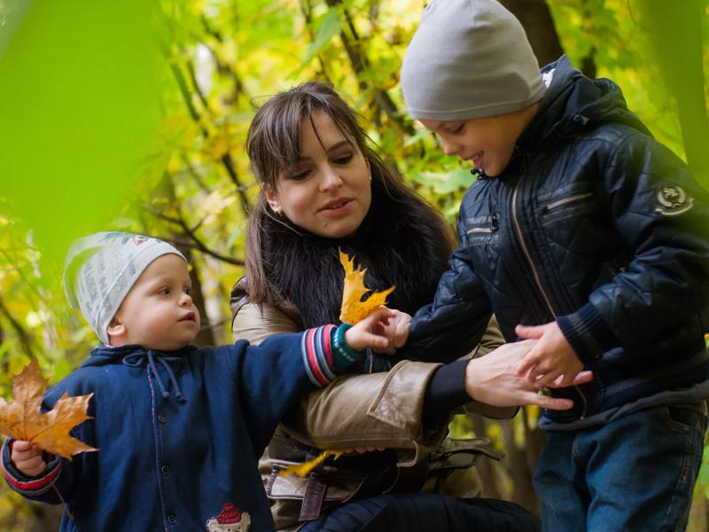 mom and children hiking together