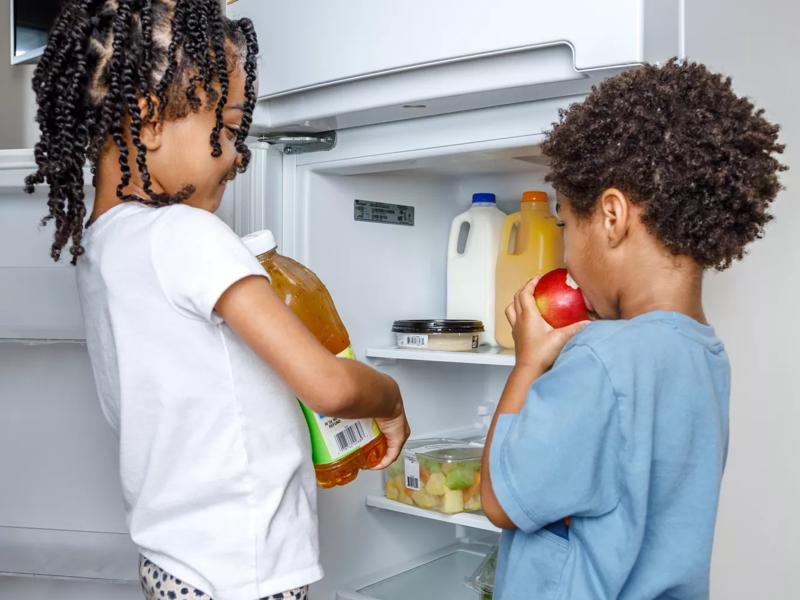 Father Preparing Food in Kitchen