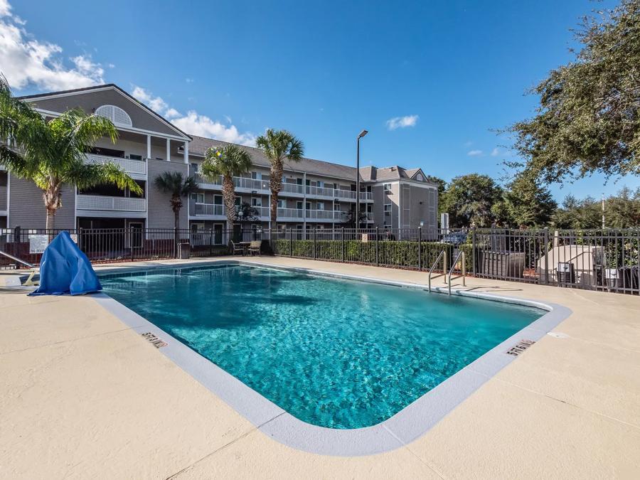 HomeTowne Studios Orlando South Outdoor Swimming Pool Image