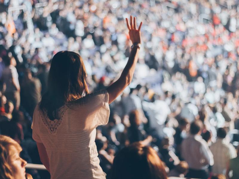 people at a concert, convention