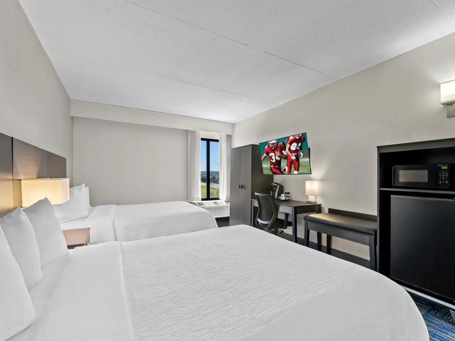 TRC1545_NS Superior 2 Queen Beds 2 PRO Approved 7-2-26_NP2QM_2 Image
