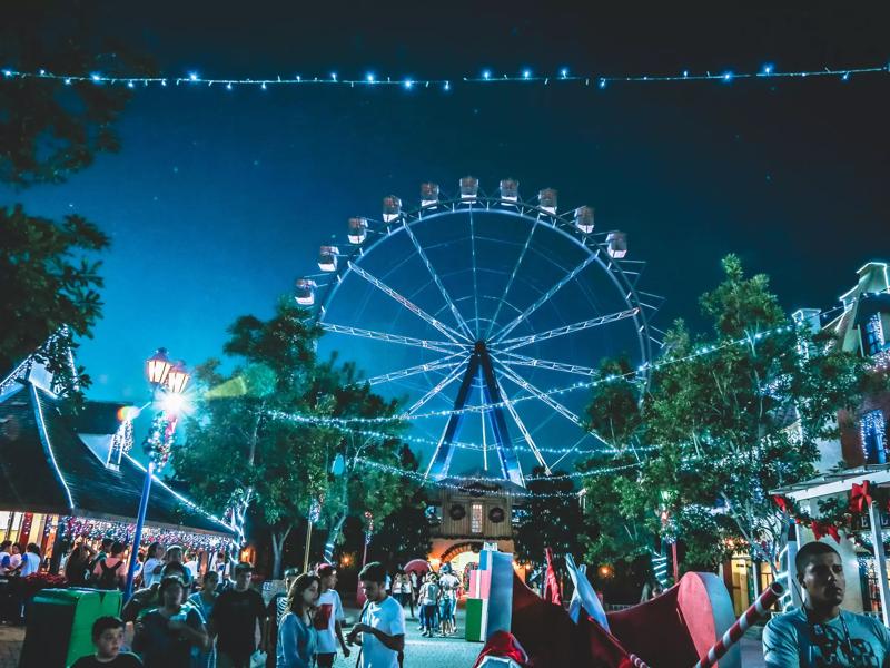 fair festival at night with crowd