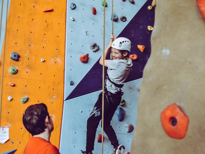 rock climbing inside a gym