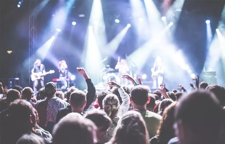 hands in the air at a concert