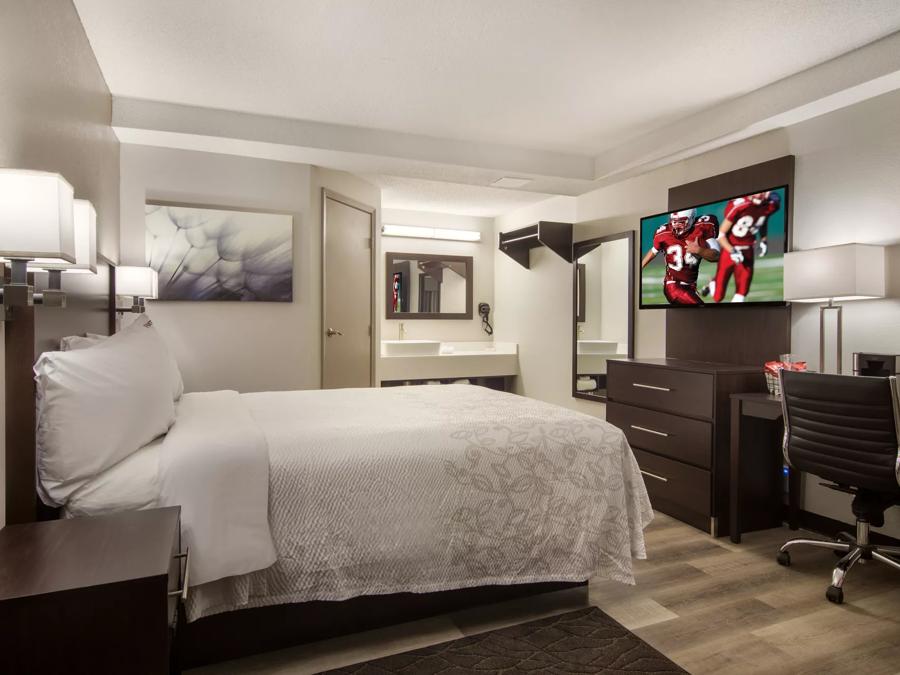 Red Roof PLUS+ & Suites Erie Premium Suite 3 Queen Beds with Kitchenette Smoke Free Amenities Image