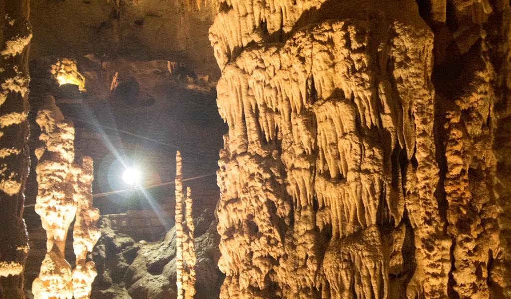 Illuminated limestone cave formations