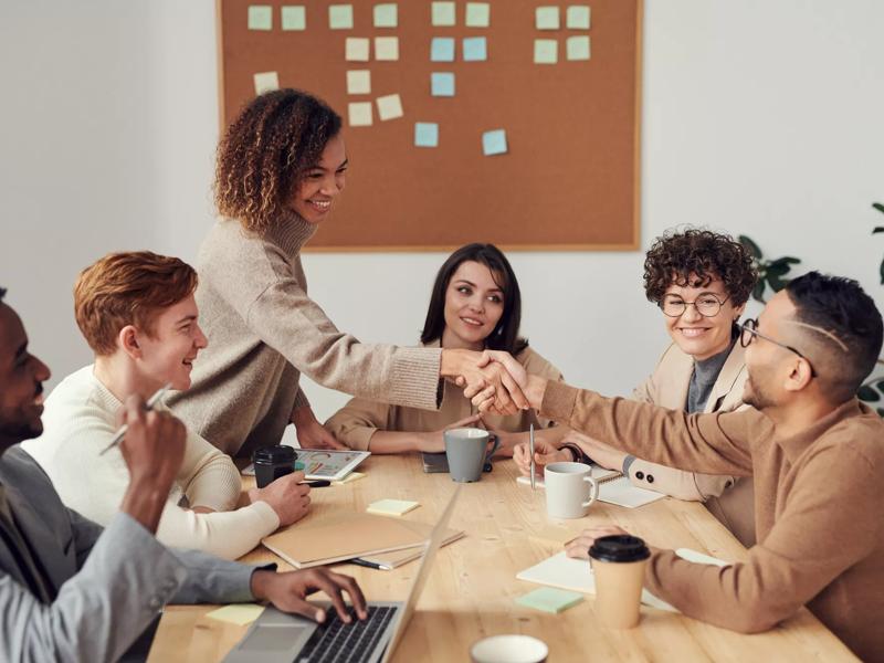 people meeting around table