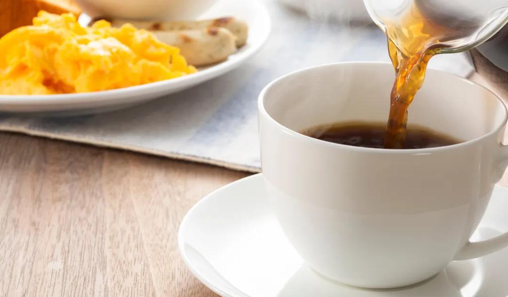 Coffee being poured into a cup