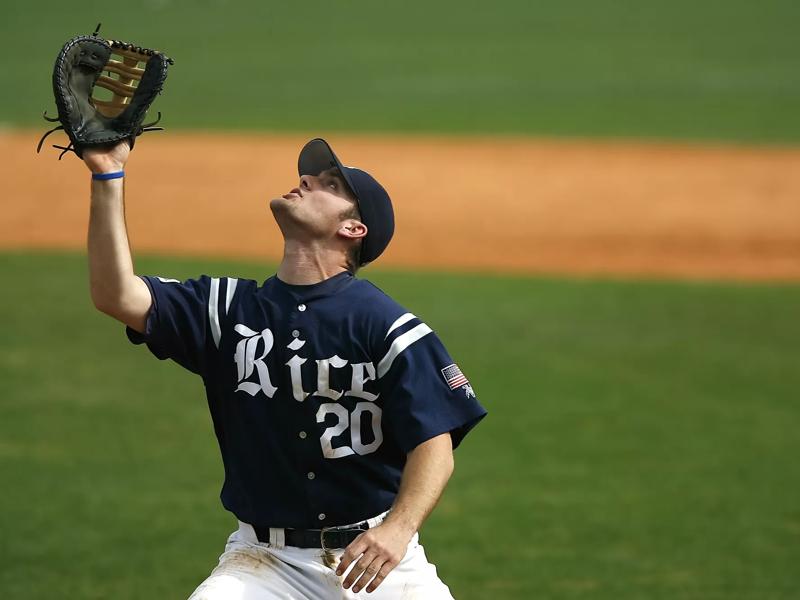 Baseball Player catching ball