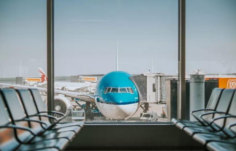 airport with airplane at sunset