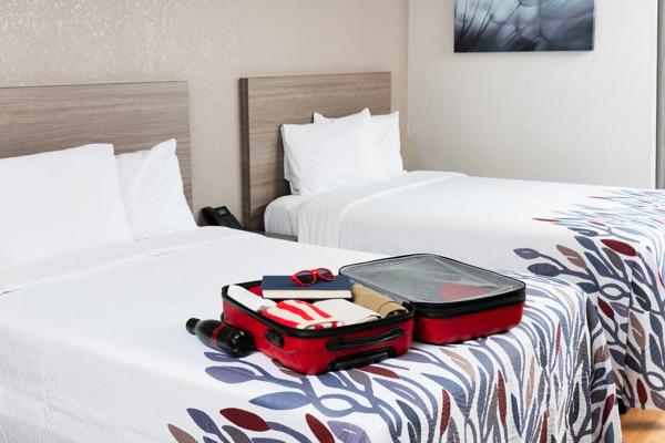 suitcase open on bed
