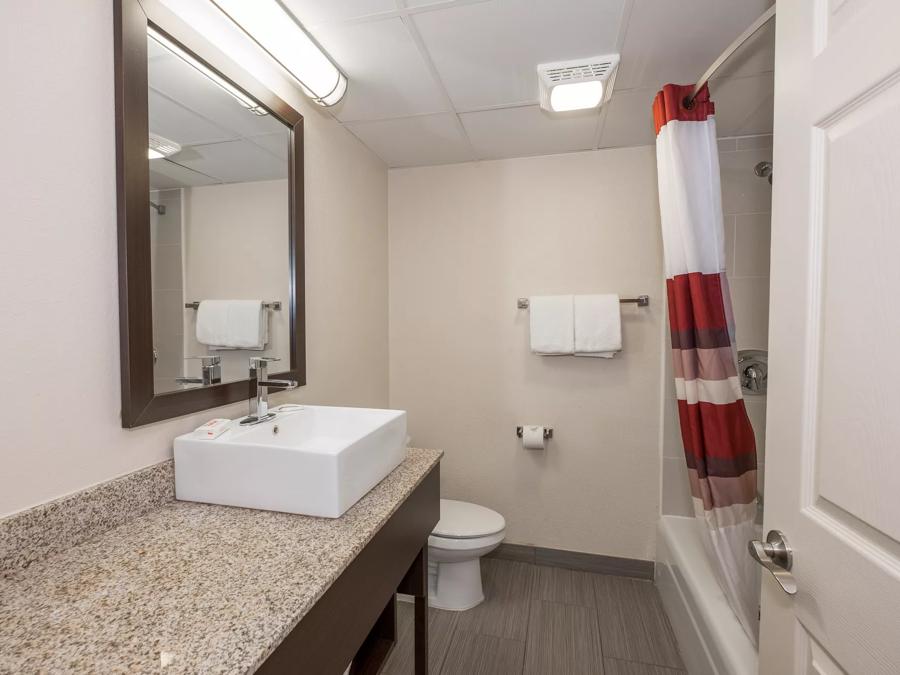 Red Roof PLUS+ Poughkeepsie Premium 2 Queen Beds Smoke Free Bathroom Image