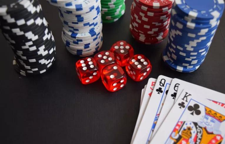 poker chips, dice, cards at casino