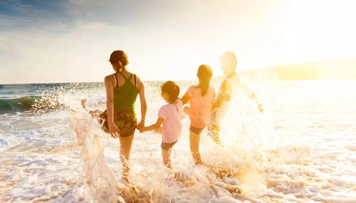 family in ocean