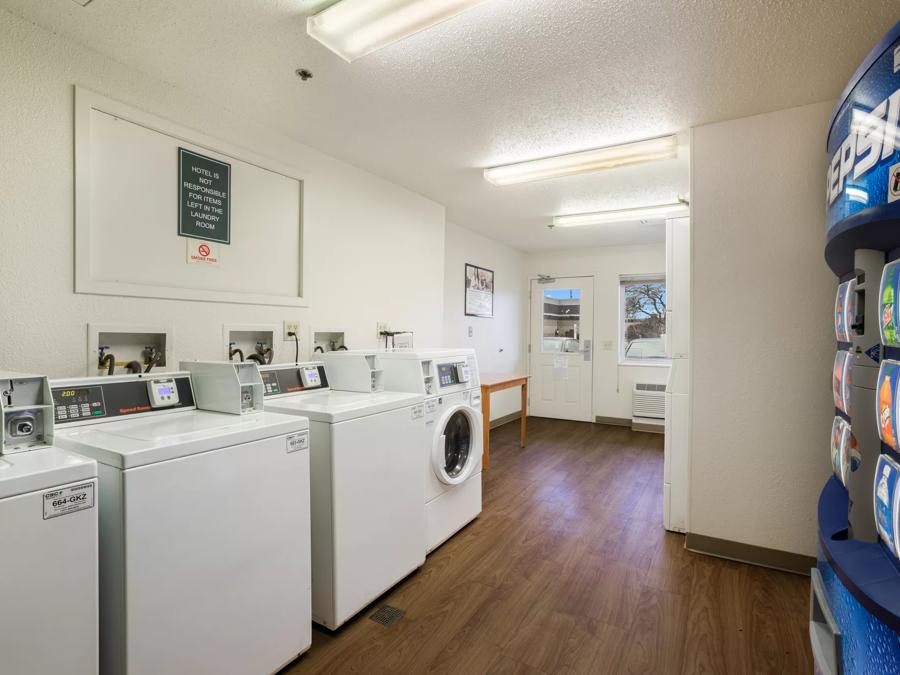 HomeTowne Studios Detroit - Livonia Guest Coin Laundry Image