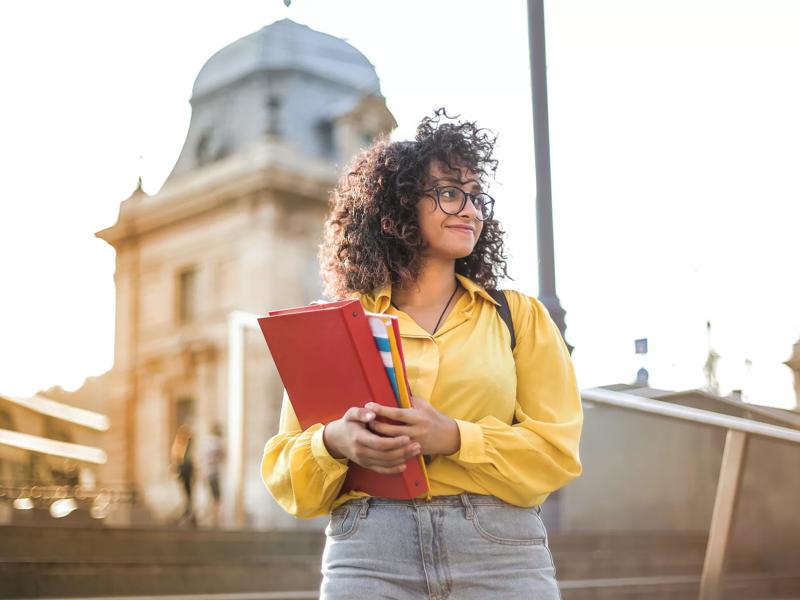 woman holding book