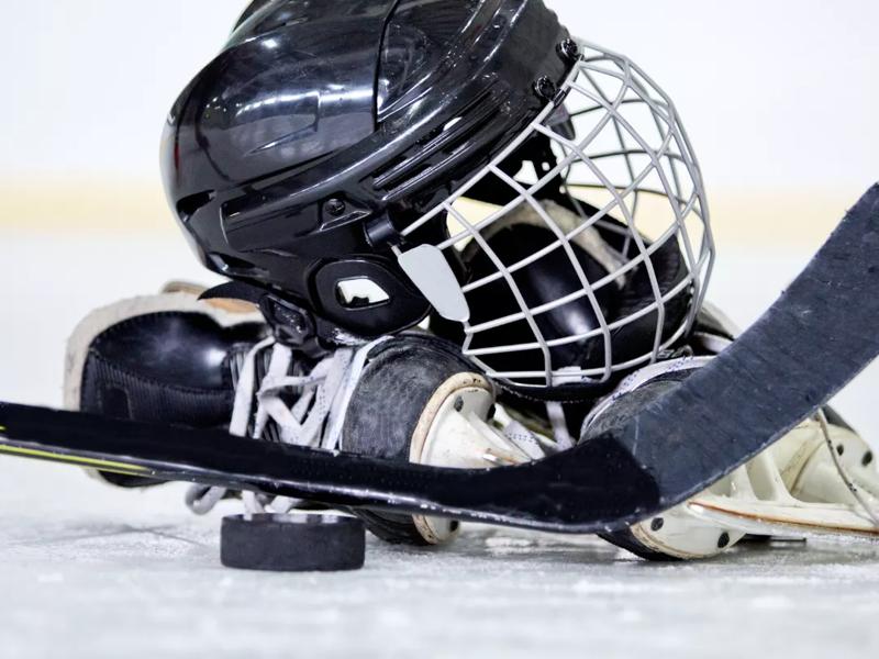 hockey helmet and stick