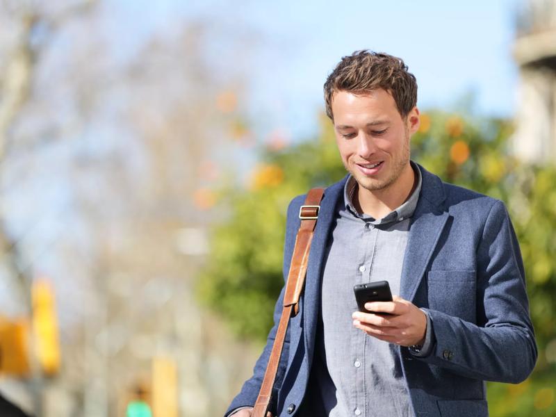 person on phone with connected icon